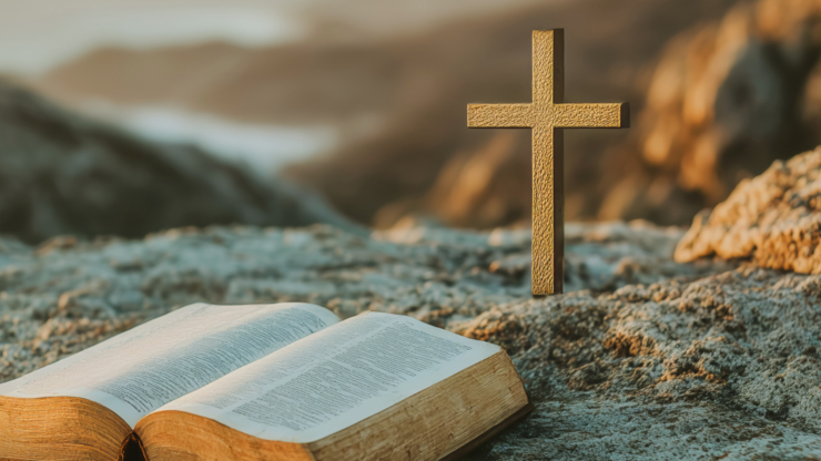 bible and cross on the mountain