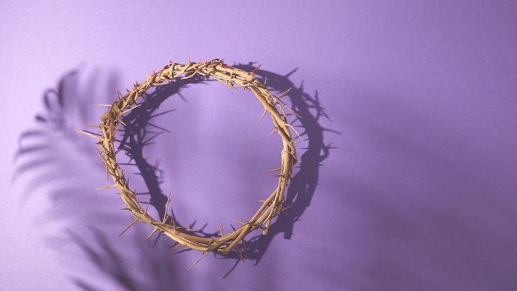 Lent season, Holy week and Good friday concept. Crown of torns on purple background.