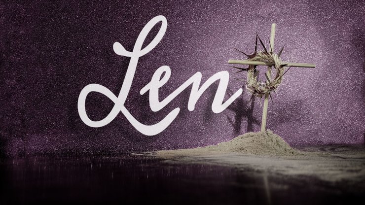 Word Lent with a woven crown of thorns on wooden cross with ash Stock photo