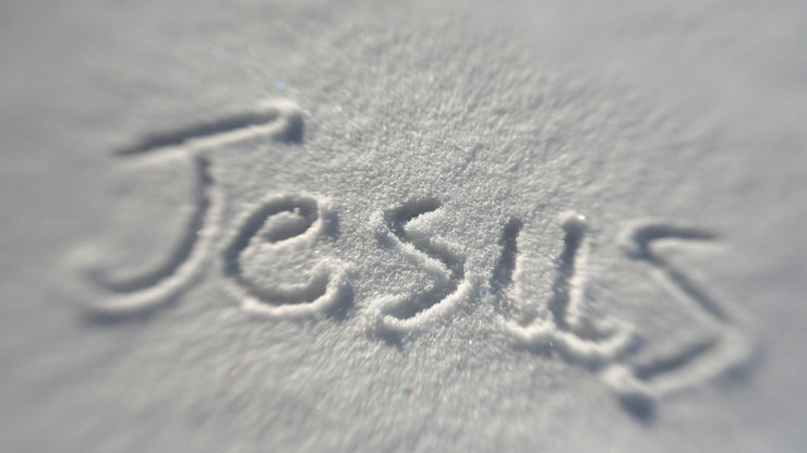 The word Jesus drawn in snow